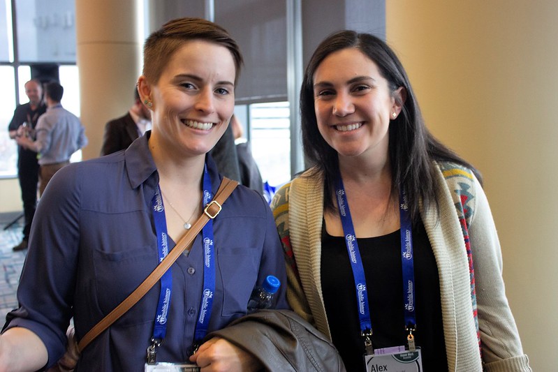 Image of two women at a convention center